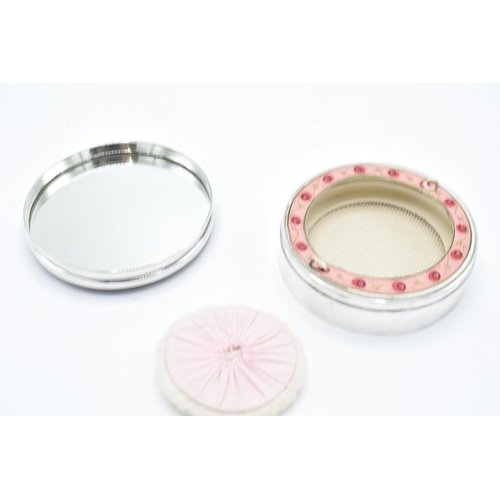 213 - A hallmarked silver ladies compact and mirror set complete with brush with tortoiseshell or similar ... 