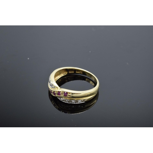 224 - A 14ct gold ladies ring set with diamonds and rubies UK size N/O. Gross weight 3.1 grams. Marked 585... 