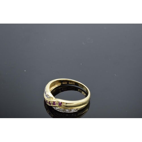 224 - A 14ct gold ladies ring set with diamonds and rubies UK size N/O. Gross weight 3.1 grams. Marked 585... 