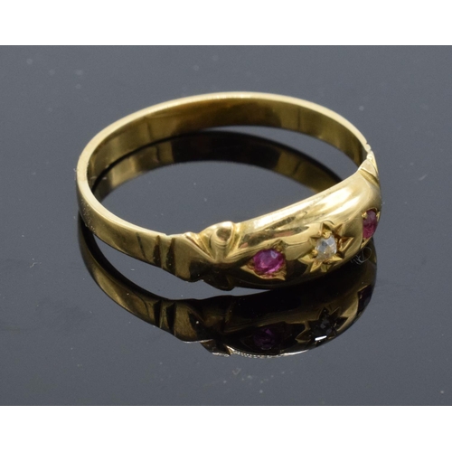 226 - 18ct gold ladies ring set with rubies and a diamond stone. UK size P/Q. Gross weight 2.2 grams. Unma... 