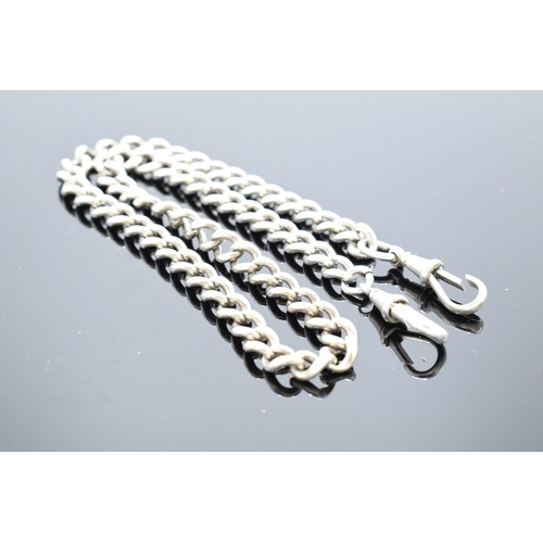 232 - Silver Albert watch chain 46cm in length. 47.7 grams. Unmarked, 'S.S' on each clasp.