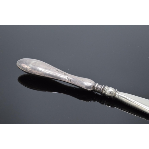 235 - A silver handled shoehorn. Birmingham 1913.