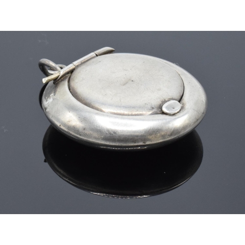 236 - A silver circular compact with mirror contained in the lid Birmingham 1918. 11.9 grams gross weight.... 