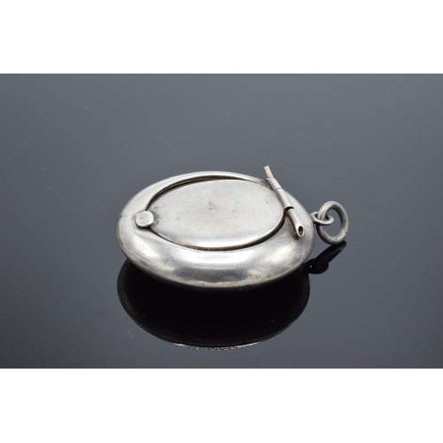 236 - A silver circular compact with mirror contained in the lid Birmingham 1918. 11.9 grams gross weight.... 