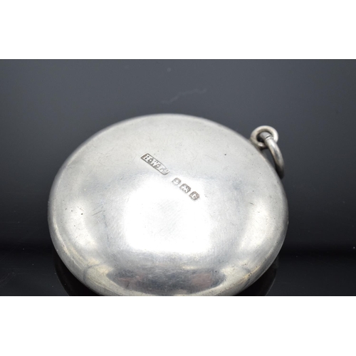 236 - A silver circular compact with mirror contained in the lid Birmingham 1918. 11.9 grams gross weight.... 