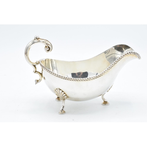 241 - A quality silver plated gravy boat made by Lowe and Sons Chester. Some age related wear and tear.