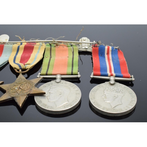 242a - A group of World War Two medals set on a bar to include the 1939-1945 Star, The Africa Star, The 193... 