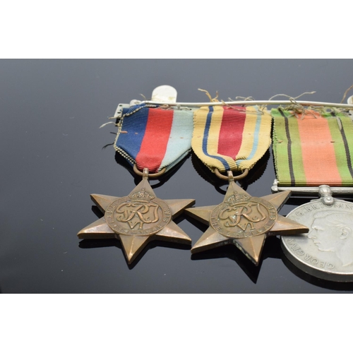 242a - A group of World War Two medals set on a bar to include the 1939-1945 Star, The Africa Star, The 193... 