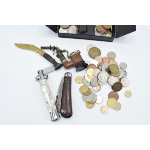 246 - A mixed collection of items to include a hallmarked silver badge, 3 silver coins, a collection of wo... 