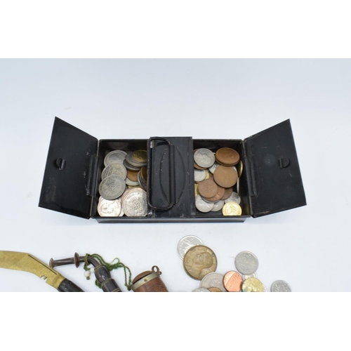 246 - A mixed collection of items to include a hallmarked silver badge, 3 silver coins, a collection of wo... 