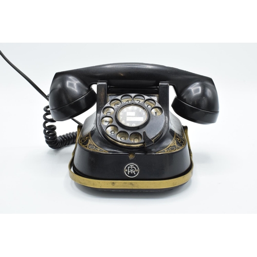 252 - MFG Company Bell Telephone Belgique with Bakelite  phone. Displays well. Untested. 16cm tall.