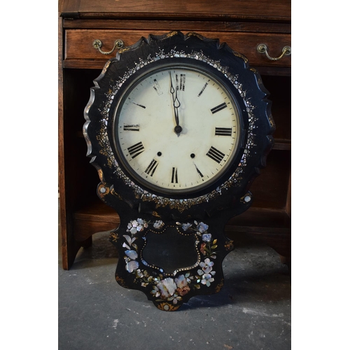 256 - A Victorian papier-mache wall clock decorated with Mother of Pearl inlay with Roman numerals painted... 