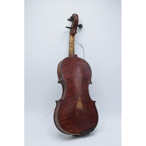 257 - A late 19th/ early 20th century violin and associated bow with the following label on the inside 'E.... 