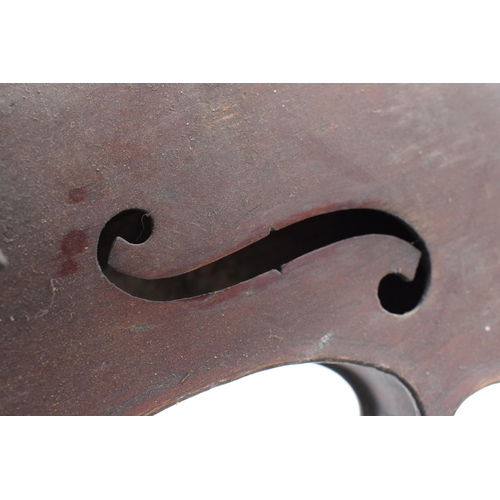 257 - A late 19th/ early 20th century violin and associated bow with the following label on the inside 'E.... 