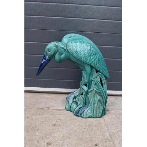 265 - A large 20th century ceramic model of a pelican/ heron in a turquoise blue glaze, believed to be Con... 