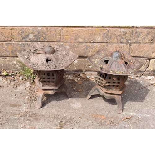 271 - A pair of 20th century cast metal garden pagodas/ lanterns