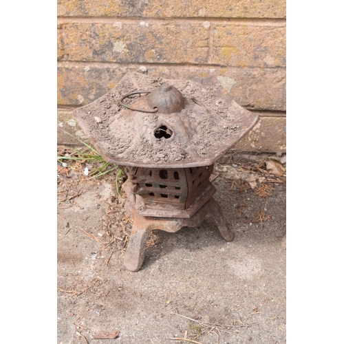 271 - A pair of 20th century cast metal garden pagodas/ lanterns