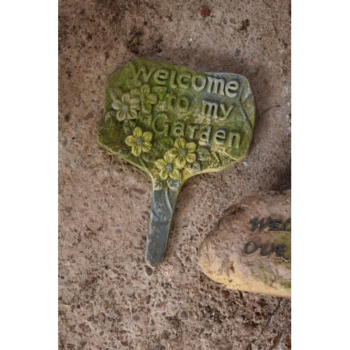 277 - A collection of garden signs to include Beware the Dog, Welcome to our Garden gnome and another Welc... 