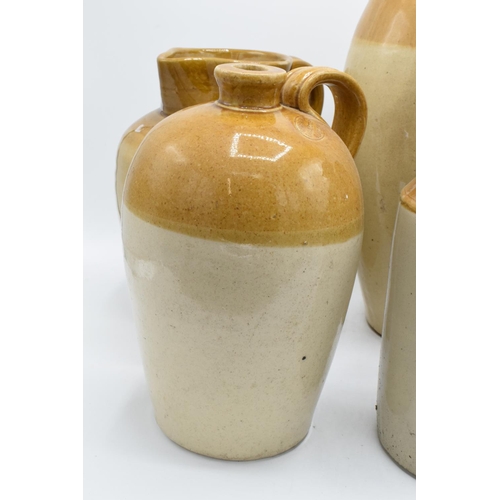 28 - A collection of stoneware flagons to include J H Jones and Sons Beverage Brewers, Grosvenor of Glasg... 