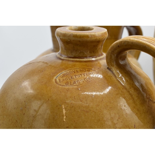 28 - A collection of stoneware flagons to include J H Jones and Sons Beverage Brewers, Grosvenor of Glasg... 