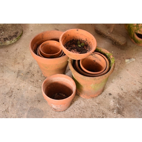 281 - A collection of 20th century terracotta garden pots and planters approx 8-10