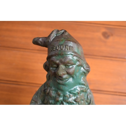 282 - A 'Record' advertising cast iron garden feature depicting a gnome sat down