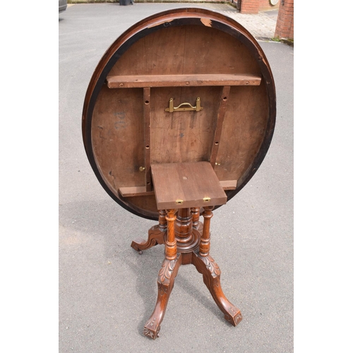 291 - Late 19th century Victorian walnut veneered table with tilt top movement. In good condition with som... 