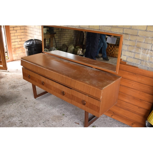 292 - A 1960s G-Plan style teak veneer mirror backed sideboard