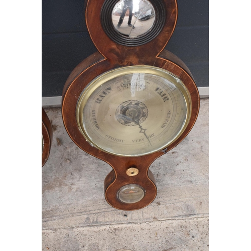 293 - A pair of 19th century mahogany barometers one with inlaid motifs such as shell (both a/f). Please c... 