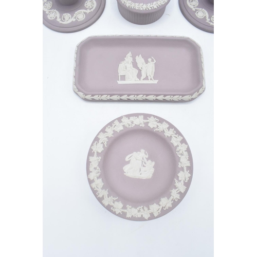 51 - A collection of Wedgwood Jasperware in a lilac colour to consist of a oval tray, a pin tray, a circu... 