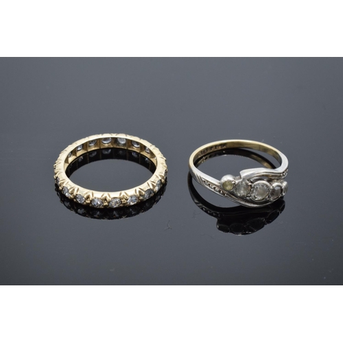 220D - An antique gold eternity ring set with clear stones (tests as 9ct) UK size K/L (gross weight 1.3 gra... 