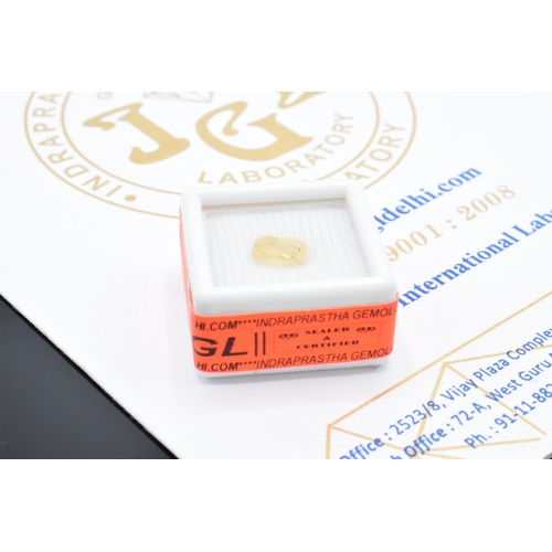 220J - A natural yellow sapphire weighing 2.19 cts sealed in original packing with the certificate from the... 