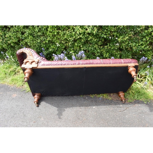 331 - An Edwardian/ early 20th century chaise longue with leather upholstery. 195cm long. In good conditio... 