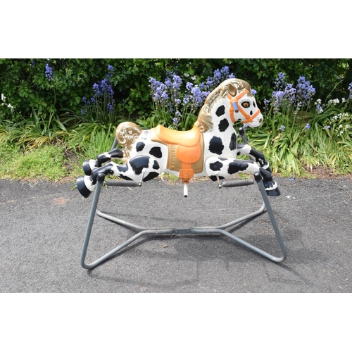 332 - A vintage 20th century Mobo metal spring mounted rocking horse. In good condition with signs of age-... 