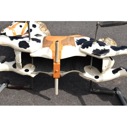 332 - A vintage 20th century Mobo metal spring mounted rocking horse. In good condition with signs of age-... 