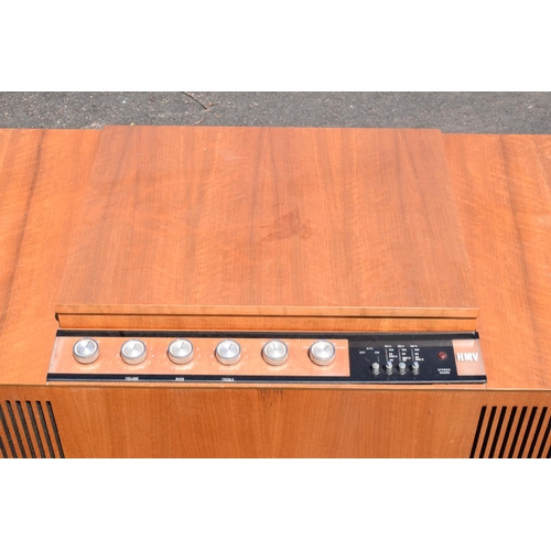 334 - HMV teak radiogram unit. 96 x 44 x 60cm. In good condition with signs of age-related wear and tear. ... 