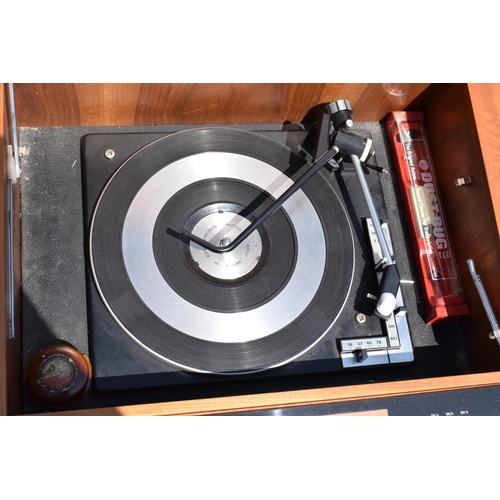 334 - HMV teak radiogram unit. 96 x 44 x 60cm. In good condition with signs of age-related wear and tear. ... 