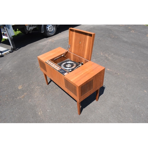 334 - HMV teak radiogram unit. 96 x 44 x 60cm. In good condition with signs of age-related wear and tear. ... 