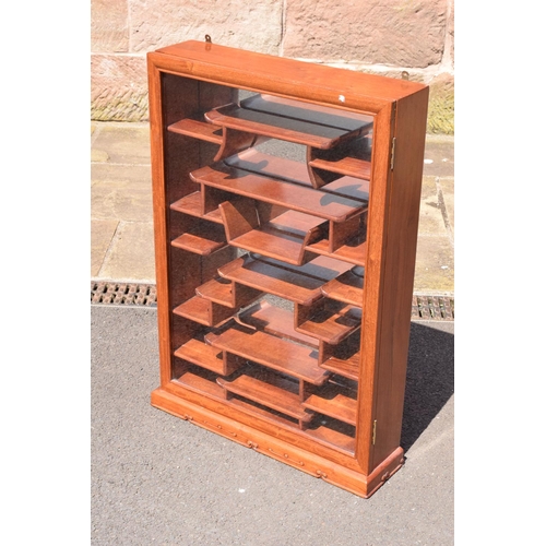 337 - A 20th century fruit wood style ornate display cabinet. 53 x 13 x 75cm tall.