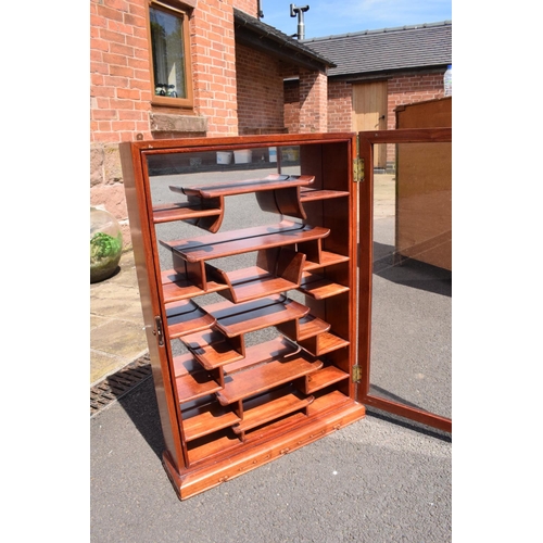 337 - A 20th century fruit wood style ornate display cabinet. 53 x 13 x 75cm tall.