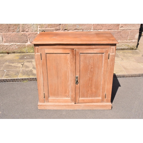 339 - Early 20th century hardwood 2 door cabinet in elm, ash or similar hardwood. In good functional condi... 