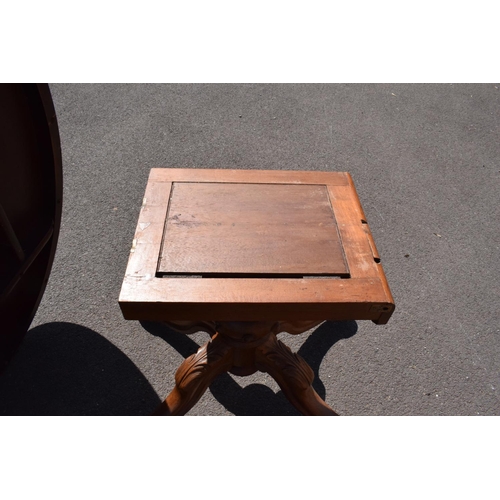 340 - Victorian tilt top table on ornate base. 146 x 105 x 75cm tall. In good functional condition though,... 