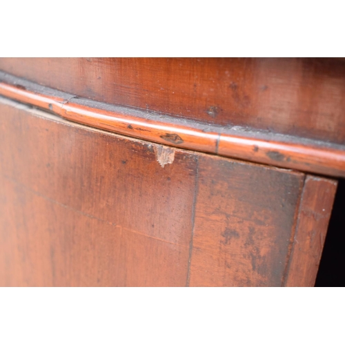 352 - A late 19th century mahogany bow-fronted corner cupboard 94cm tall. In good functional with some age... 