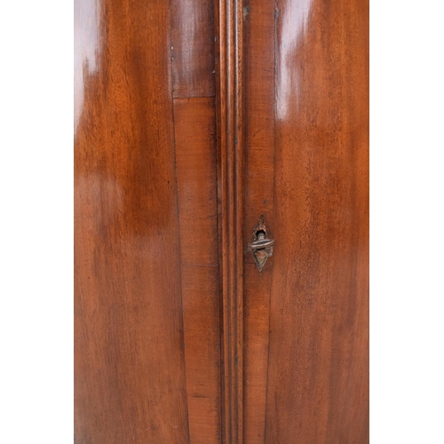 352 - A late 19th century mahogany bow-fronted corner cupboard 94cm tall. In good functional with some age... 