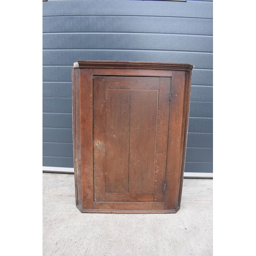 353 - Victorian oak corner cupboard 87cm tall. In good functional condition though as expected are showing... 