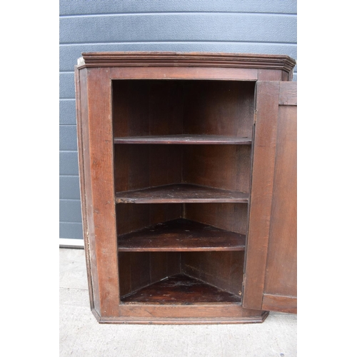 353 - Victorian oak corner cupboard 87cm tall. In good functional condition though as expected are showing... 