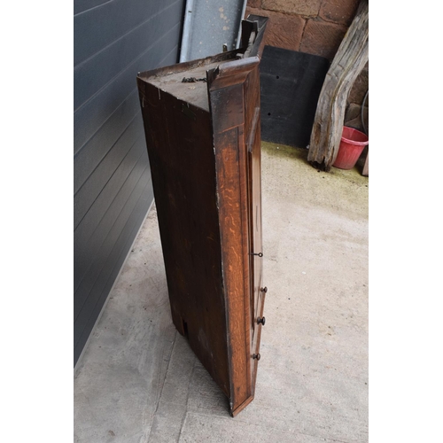 354 - A Georgian period oak corner cupboard with raised sections and a single drawer. 128cm tall, 82cm at ... 