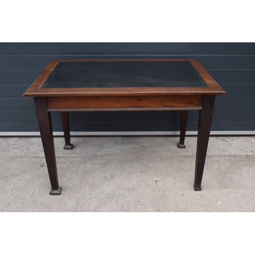 358 - An early 20th century side table / desk with a dark leather insert. 115 x 76 x 77cm. In good functio... 