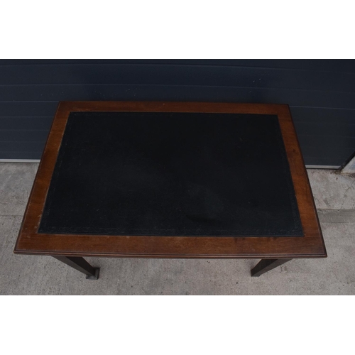 358 - An early 20th century side table / desk with a dark leather insert. 115 x 76 x 77cm. In good functio... 