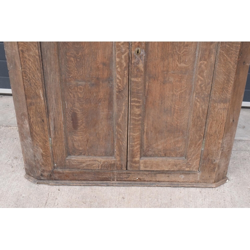 360 - Large early 19th century oak farmhouse double corner cupboard. 138cm tall. 113cm widest. 62cm deepes... 